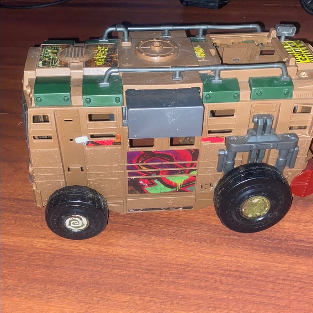 Action-Packed Brown and Green Toy Vehicle